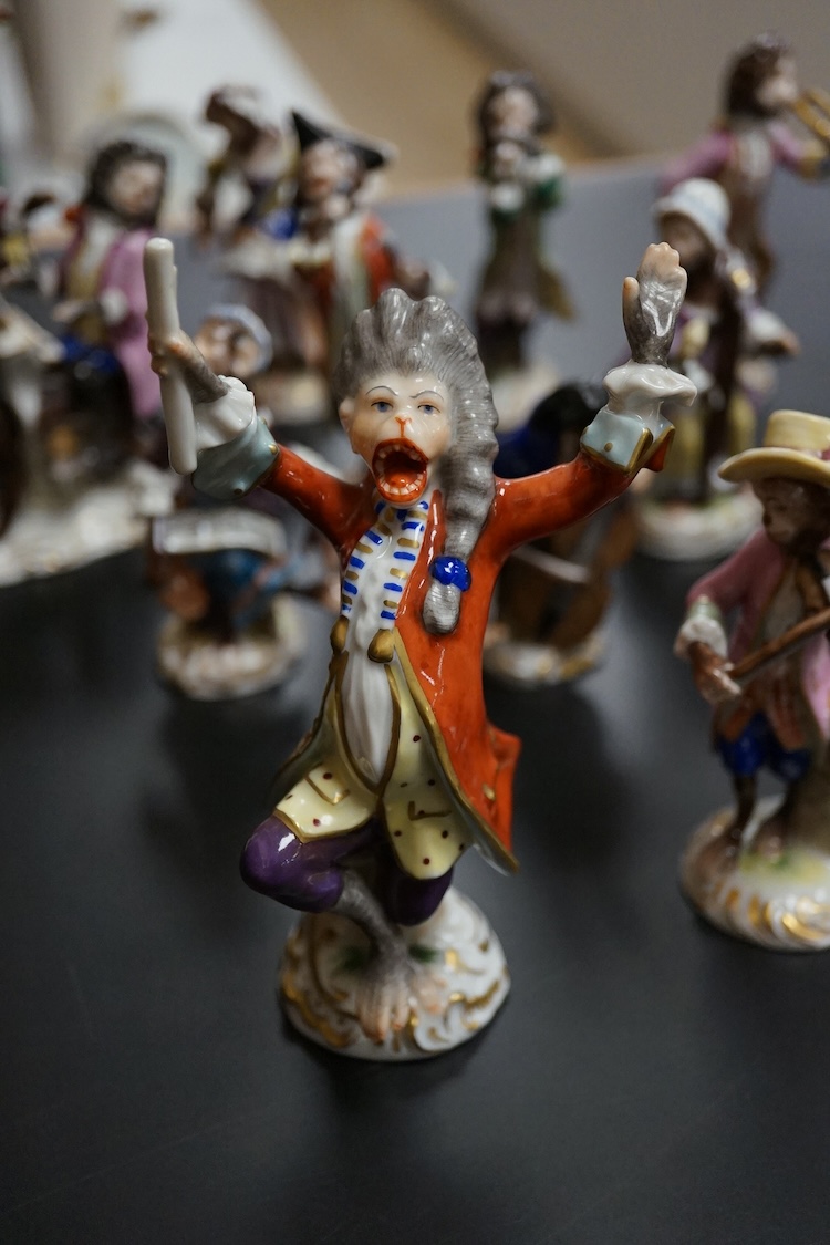 A group of twenty German porcelain monkey band figures, largest 15.5cm high